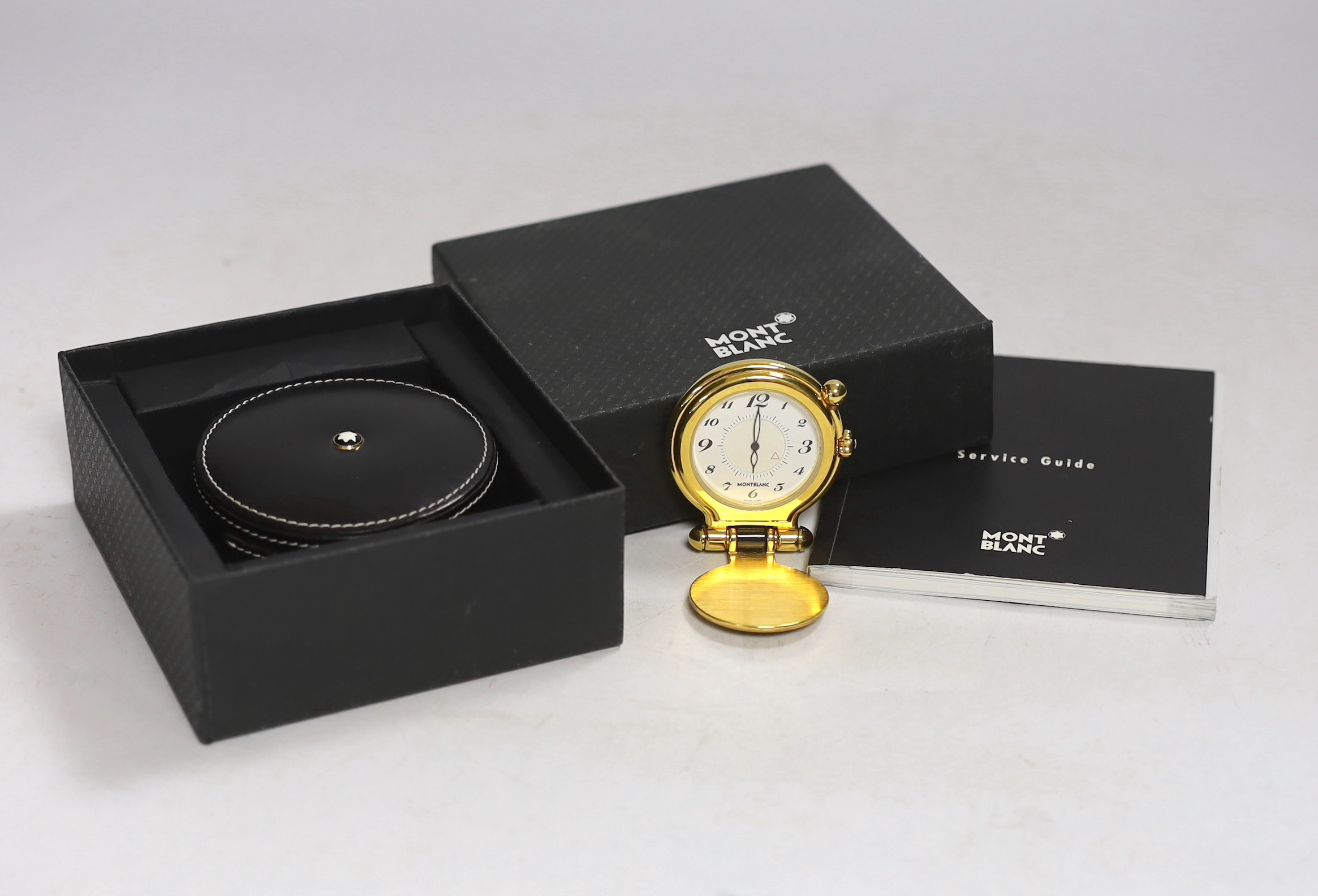 A cased Montblanc travelling timepiece with case and booklet